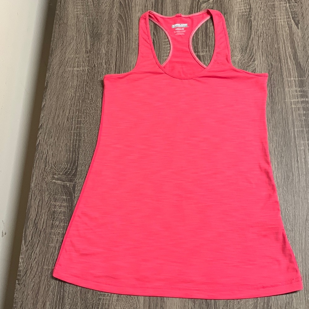 NWOT never worn pink Kirkland Signature Word out shirt